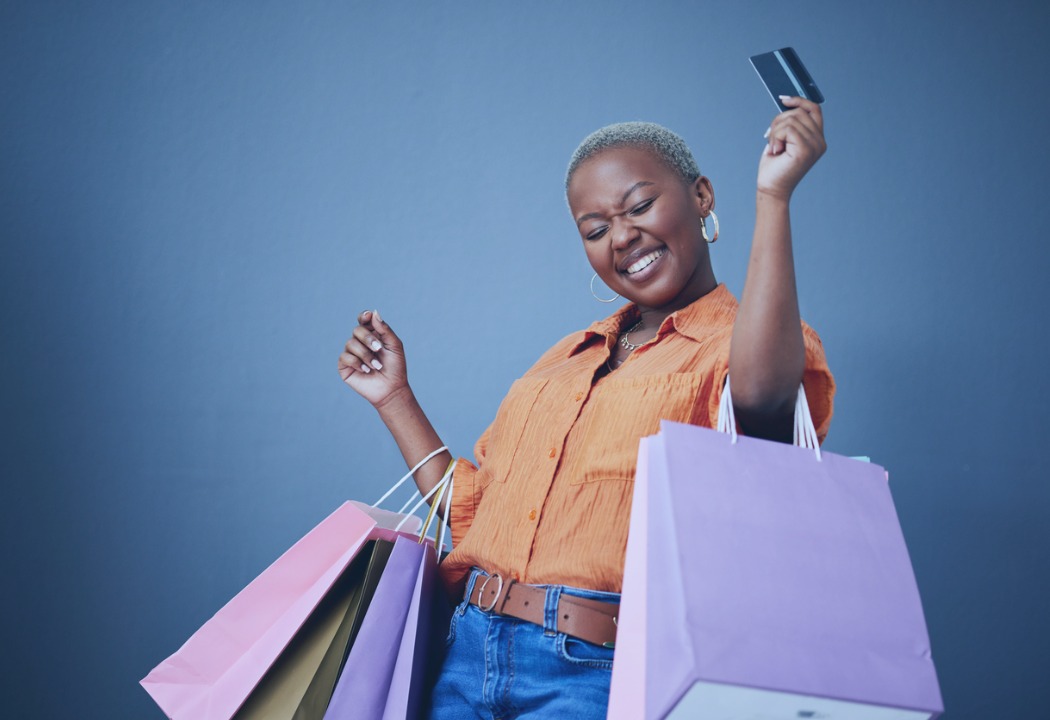 Happy women, shopping with credit card