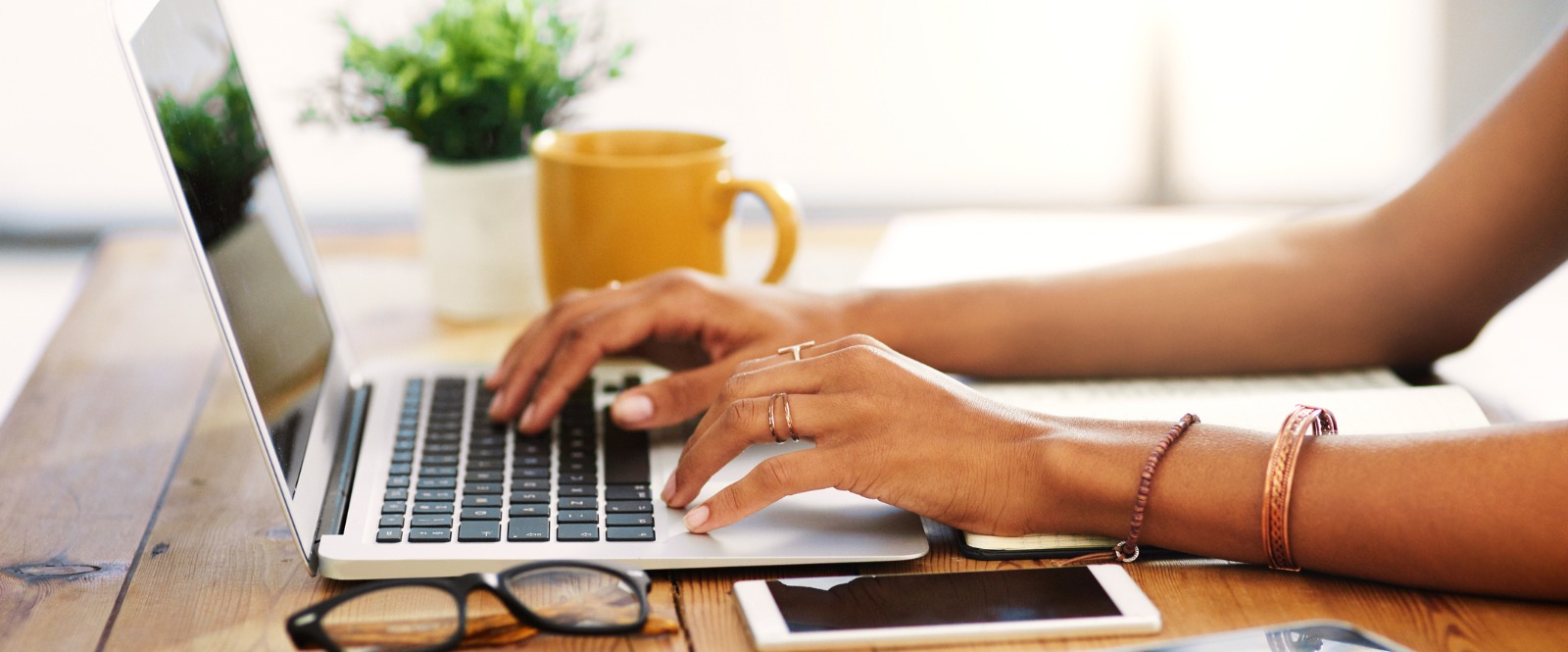 Laptop, coffee, women typing