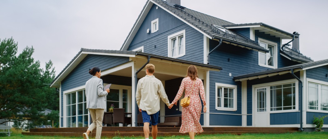 Couple viewing home with realtor