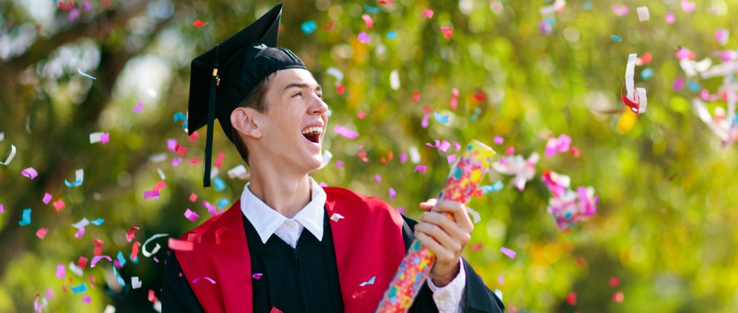 Young man, graduate, celebrating