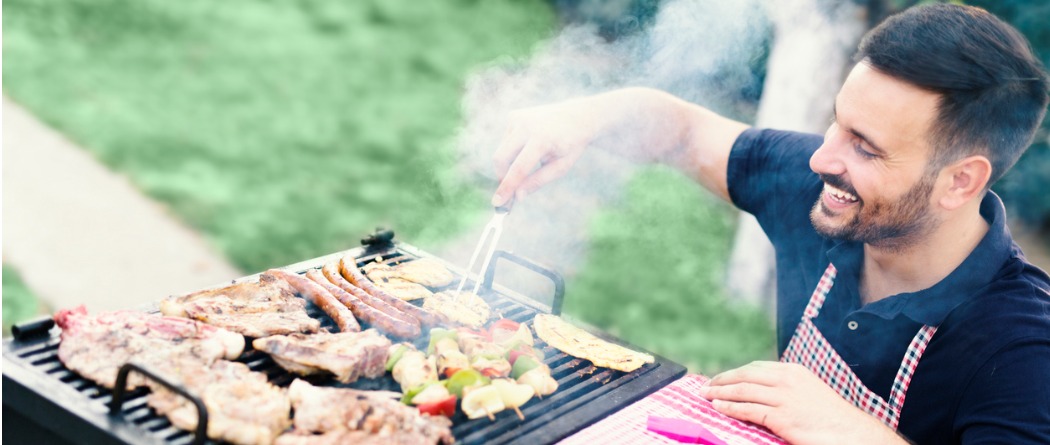 Father cooking on grill